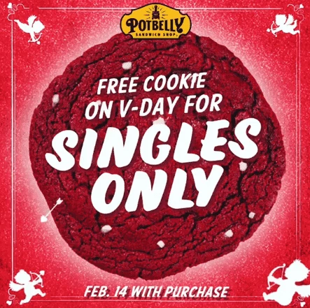 Мы магазин сэндвичей. Чем бы нам заманить людей без пары?   Дадим им печеньку! И купидонов на**рачим! Идеально (и действительно идеально — ведь сработало… О_о)